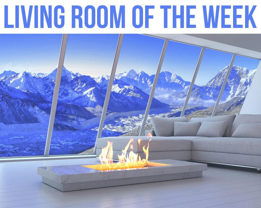 This living room could also easily be the View of the Week. Other than the amazing view, the simple, white interior looks clean and modern. It goes without saying that the open fireplace is the coolest piece in this Living Room of the Week.

Christela... facebook.com/10608245198754…