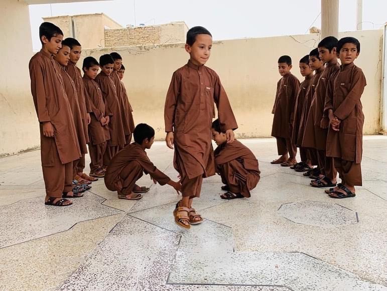 hrfcares's tweet photo. #EidMubarak from the children at Sana Orphanage in Kandahar, #Afghanistan ! @hrfcares was pleased to extend financial support to the orphanage. A portion of the funds went towards the purchase of new clothes &amp; shoes for the 60 students. https://t.co/JuEMVoky3z