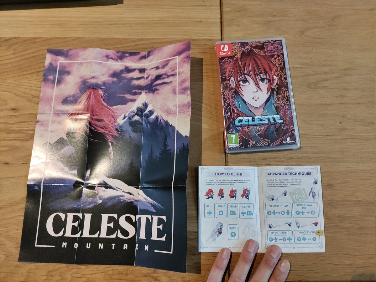 herbeupat's tweet photo. OMG a Switch game with a real old school paper notice ! (And a nice mini poster 🙂) That's so cool 😁🍓 @celeste_game https://t.co/Hn6mBx4ojN