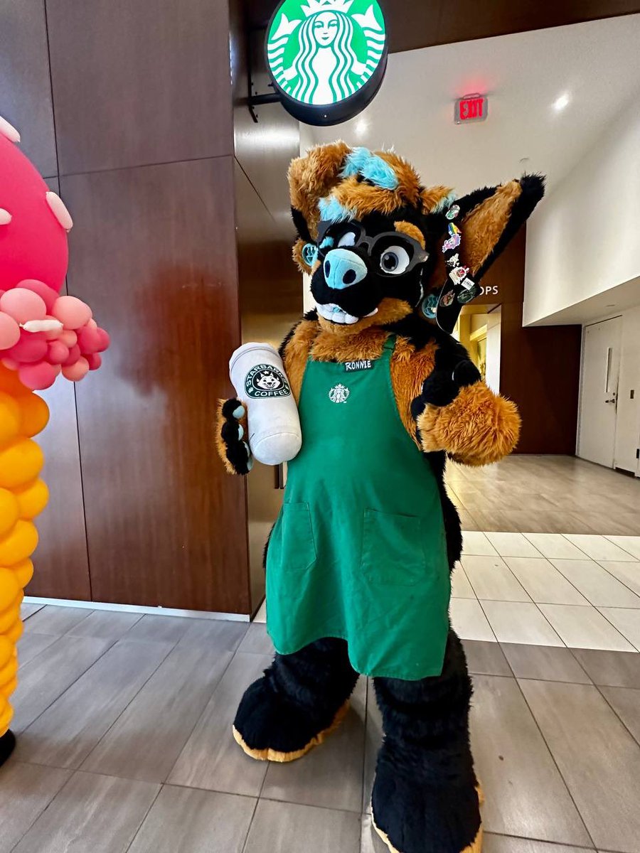 RonniePawbucks's tweet photo. Hi welcome to buckstar, may I take your order? #anthrocon2023 #starbucks #furry #fursuiter https://t.co/UN9SzwKr7e