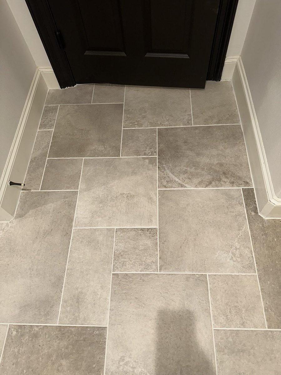 Look at this memorizing flooring pattern! Our flooring experts were able to remove the homeowners old carpet and replace it with this amazing looking Versailles pattern porcelain tile. Through the precision of this flooring pattern this home now has a unique and beautiful look.