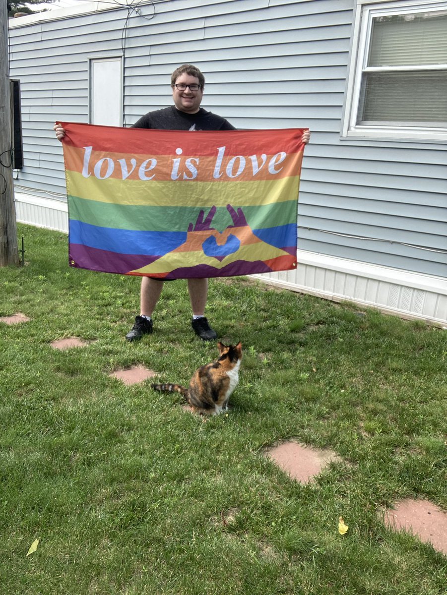 MichaelDaGaymer's tweet photo. It’s raining out today so here’s some pics I took yesterday in my backyard with my love is love pride flag to brighten up the day in honor of Pride Disability Month! Happy July ☀️🏳️‍🌈🌈 ♿📆❤️🧡💛💚💙💜 #Gay #Pride #GayGuy #GayPride #GayWorld #GayLife #PrideDisabilityMonth #Autism https://t.co/TVEW01lTCg