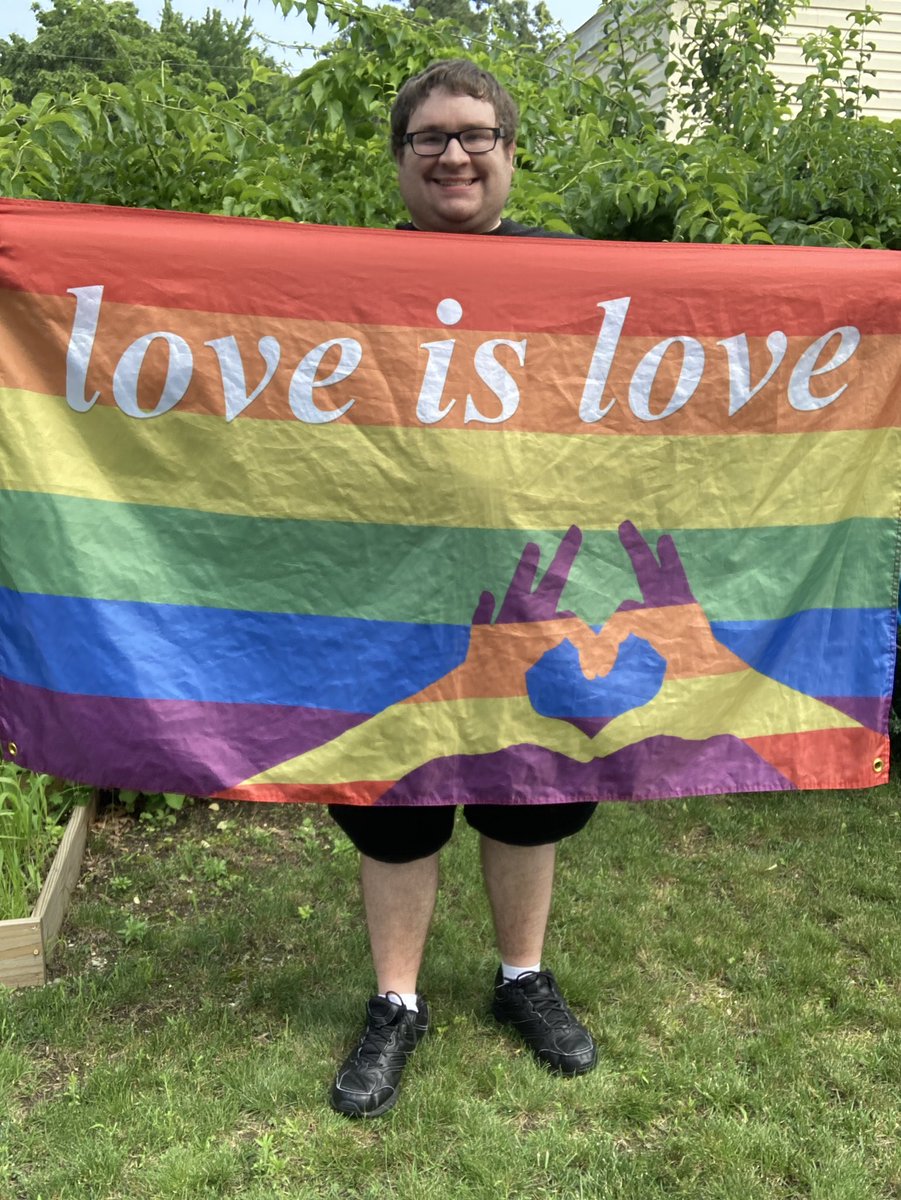 MichaelDaGaymer's tweet photo. It’s raining out today so here’s some pics I took yesterday in my backyard with my love is love pride flag to brighten up the day in honor of Pride Disability Month! Happy July ☀️🏳️‍🌈🌈 ♿📆❤️🧡💛💚💙💜 #Gay #Pride #GayGuy #GayPride #GayWorld #GayLife #PrideDisabilityMonth #Autism https://t.co/TVEW01lTCg