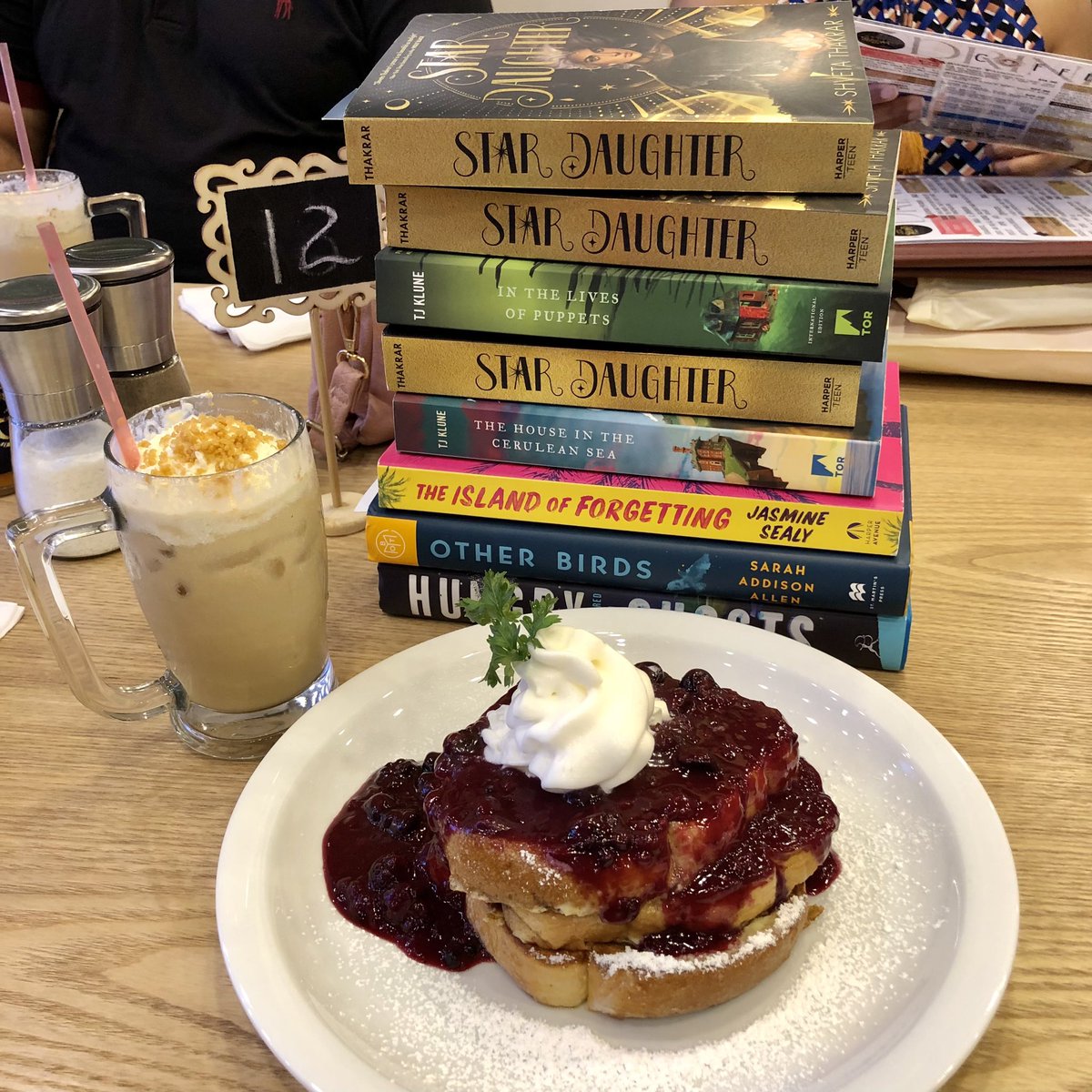 ssammygirl1's tweet photo. Is it even a Book Club meeting if there aren’t at least 20 books all over the table? #BookClub https://t.co/muyk5wjyjM