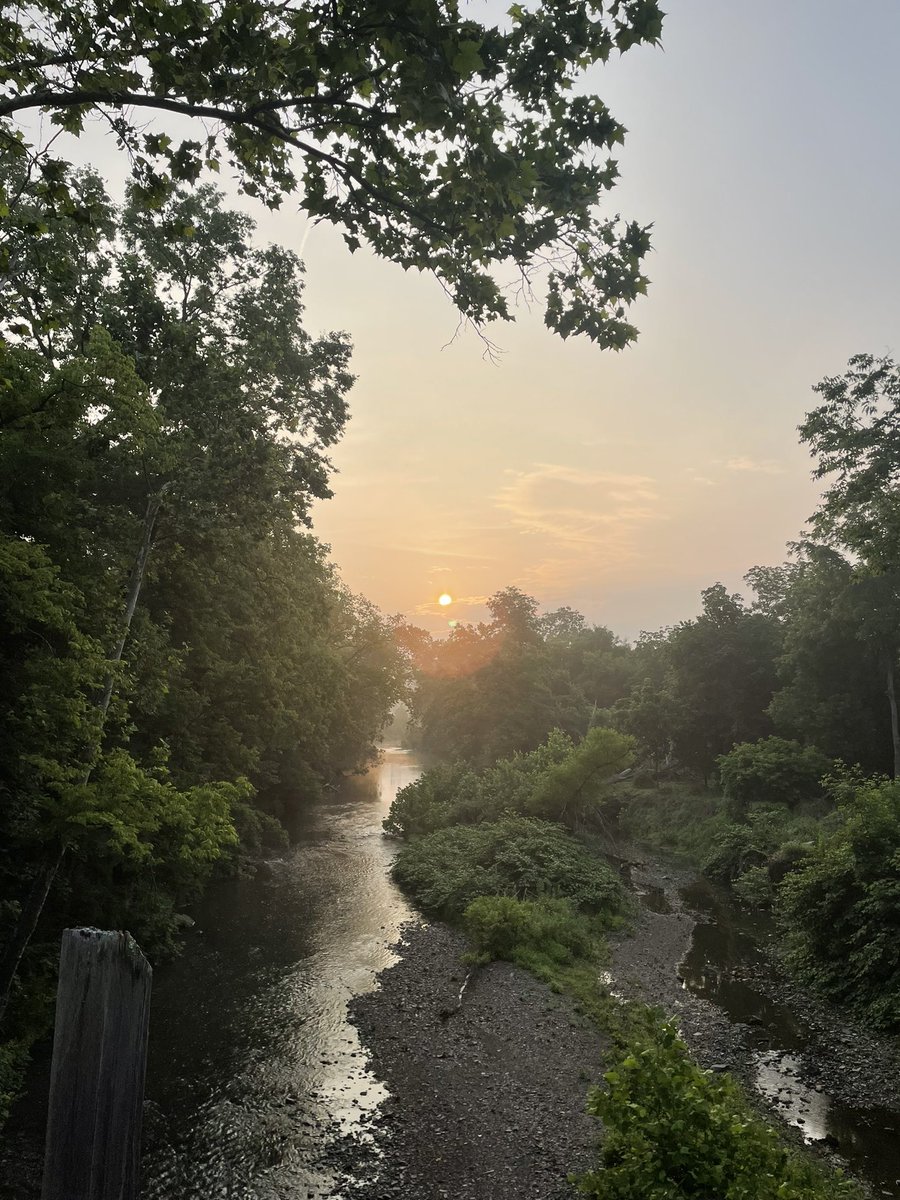 Somewhat steamy &amp; a little bit smoky sunrise on the #Perkiomen trail this week. Air quality was fair but I’m glad I got out early before it got worse. This beautiful sunrise is item 2 on <a href="/therunchat/">#RunChat 🏃</a> #runchathunt running scavenger hunt.