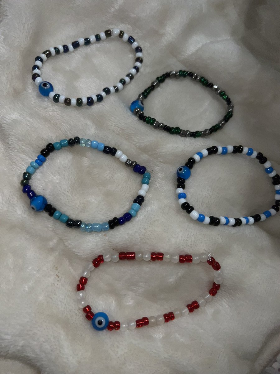 making a bunch of evil eye bracelets to give out bc we all need the good juju