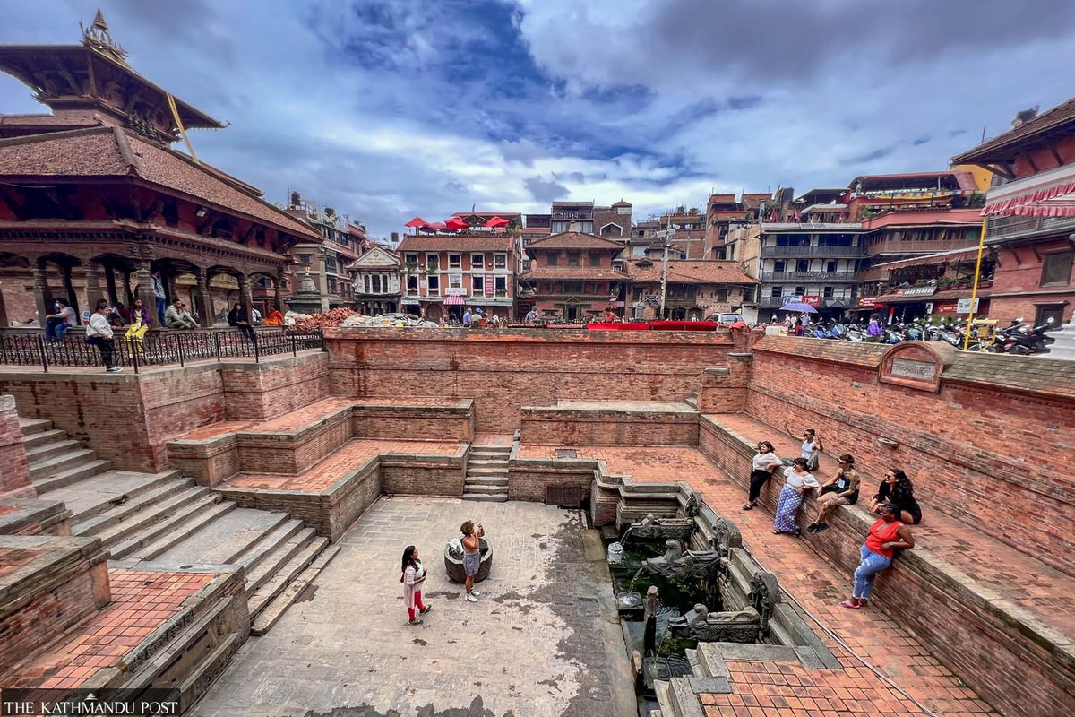 Tourists pose for photos at Manga Hiti in Patan, Lalitpur, on Sunday. 

Photo by: <a href="/Elite_Joshi/">Elite Joshi</a>