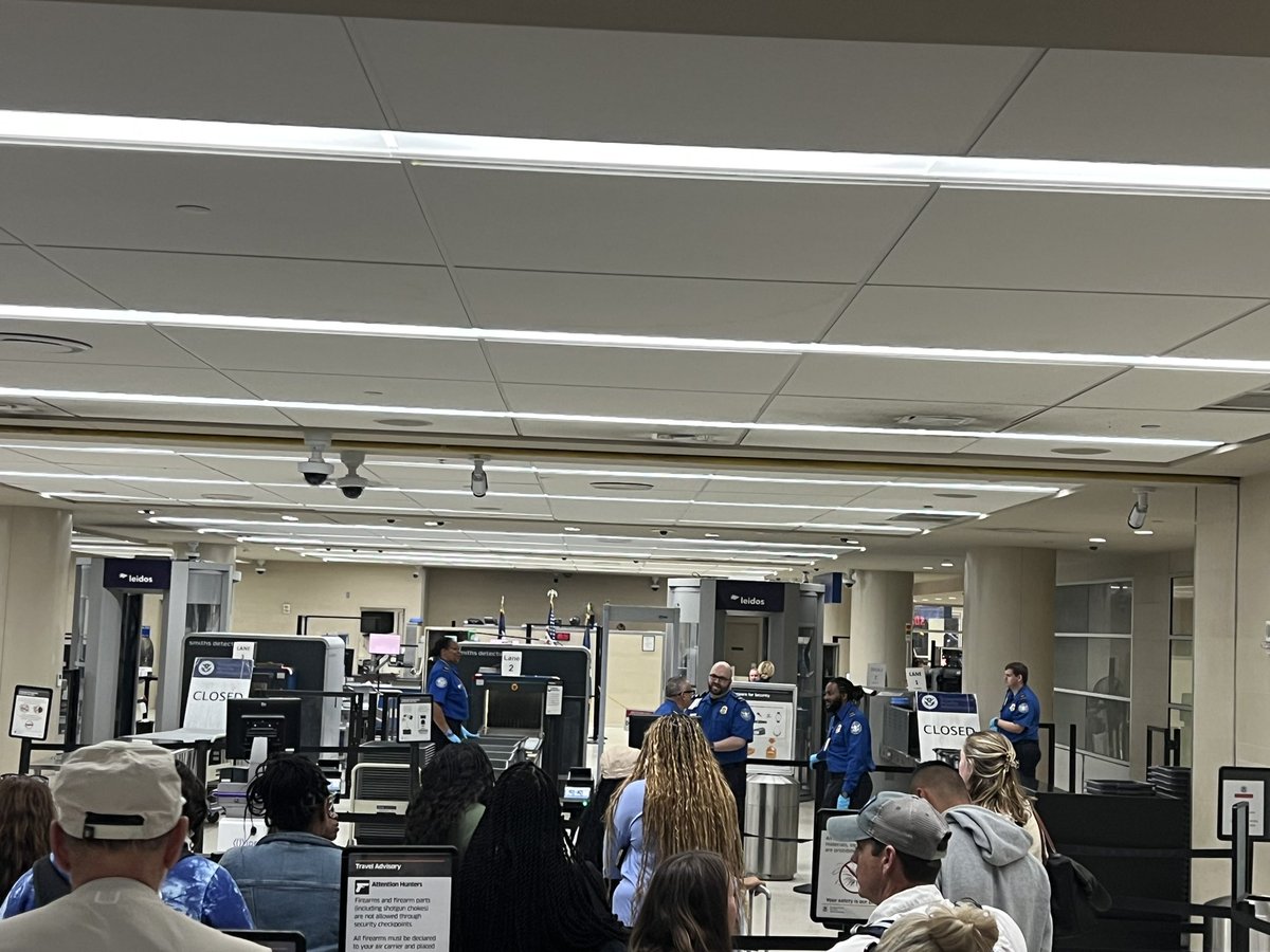JoeFish20992726's tweet photo. Waiting at San Antonio airport security line while they wait for a manifest sheet. Our original flight from Cancun to Houston was rerouted due to weather. Instead of refueling, we all got off, went through customs, rechecked our bags and went through security again.  @united https://t.co/e34GM0YIRw