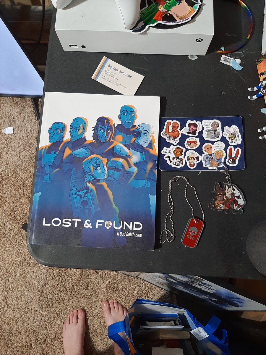 My <a href="/badbatchzine/">Lost & Found: A Bad Batch Zine | SHIPPING!</a> finally made its way out of Denver into my eager hands. Just wish it would have got here before Saturday morning so I could wear the dogtag to FanExpo but oh well 🤷‍♀️
I love the physical copy it is so beautiful ❤️