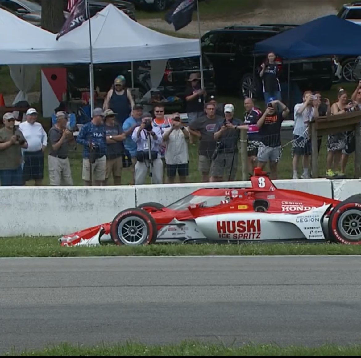 Screenshots from my iPhone video of the Marcus Ericsson crash at the start of yesterday’s Indy Car Race at Mid-Ohio. Also a shot from NBC. I standing at the fence with my hand on my hip. Had a Great time at the track yesterday. #Honda200