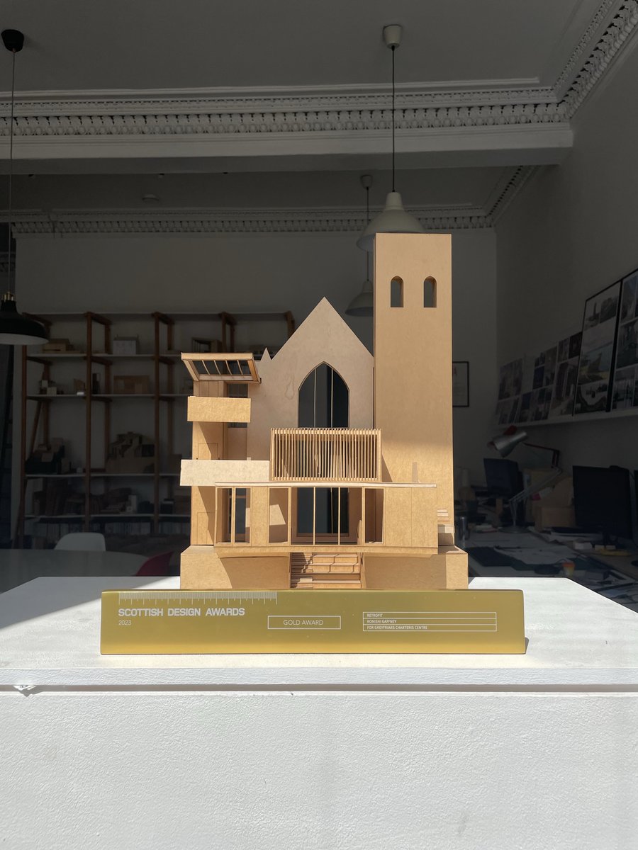 Gold in the @ScottishDesign #Retrofit category; trophy in front our project maquette in the office window. (We worked out that if it was actually gold it would weigh 3,040 grams and cost £145,990). Thanks to our clients @CharterisCentre and the whole design team.