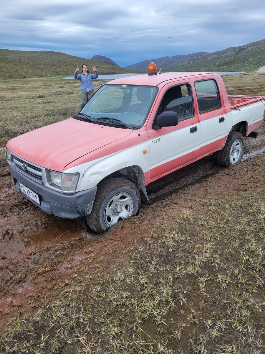 Getting stuck in the mud was not on my list of things that can happen in Kangerlussuaq, Greenland. This year is unusually wet (lake levels up 2ft!) and cold. But @SarahCuprewich still got her dust collectors installed & thanks to @PolarField we were back in action in no time