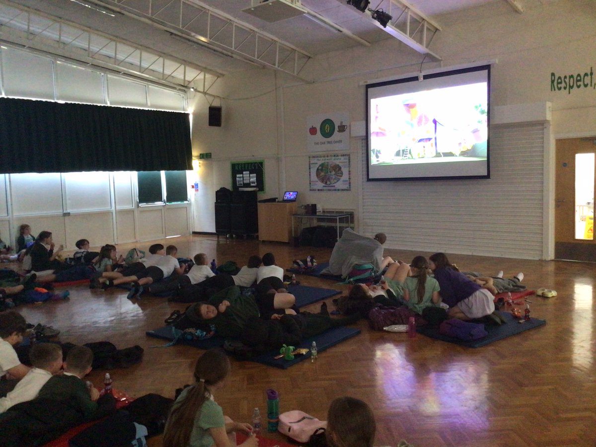 OJS_Year5's tweet photo. Year 5 are thoroughly enjoying their Movie Night. Thanks to @OjsTogether for organising it. Both staff and children are enjoying, ‘The Lorax’.🍿🎬 https://t.co/Ws1sE2txkg