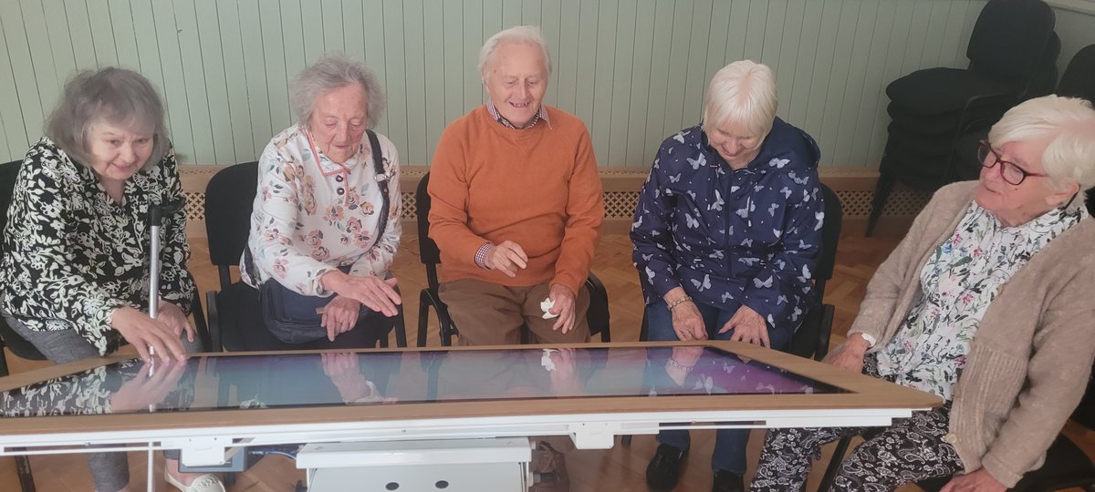 NCCTUK's tweet image. Here at Crosby House, the residents have a new 'Interactive Table' & they are absolutely loving it & a couple of the first games played was Bubble Bliss & 'Name That Tune' #bubblebliss #namethattune #interactivetable #ncctuk