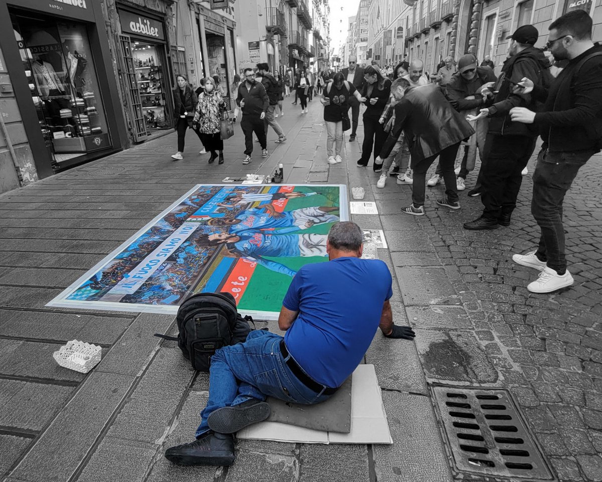 LaRoeDesign's tweet photo. @jasonrowphoto I've done a few, some of which worked, I'd like to think, as I intended, to include this capture of a street artist attaching his art to a sidewalk in Naples the afternoon before Napoli cinched the Serie A Championship.
#spotcolor #rowcase #photo #photographyisart https://t.co/N6tgO4v5GP