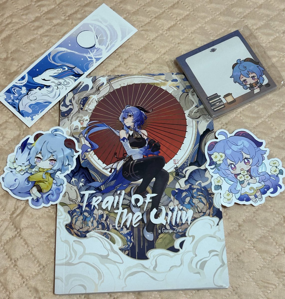 Today my copy of <a href="/ganyuzine/">Trail of the Qilin | Project complete !</a> and merch arrived! Kudos to everyone who participated in the making of this zine, it’s truly amazing! 💙💙💙