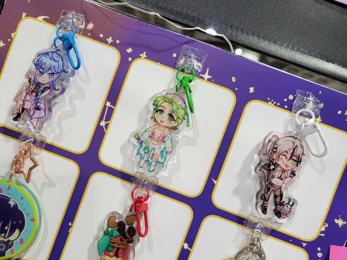 SinclairityK's tweet photo. Speaking of new art, got my #NUcarnival charms just in time for the con! If you're at #AnimeExpo2023 , swing by L26 to pick up ya boys ;3 https://t.co/zqK4xCrXRi