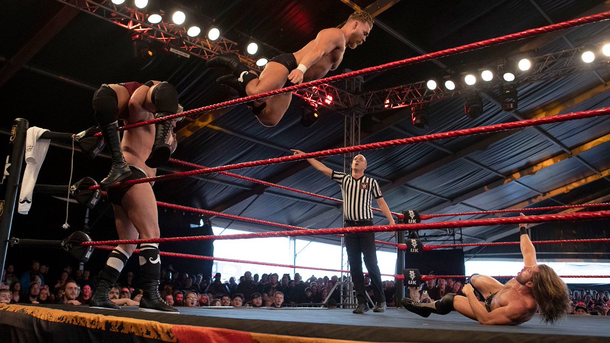 NXTUK_Legacy's tweet photo. July 3, 2019:
At Donington Park as part of Download Festival, the #NXTUK Tag Team Championship rematch between #GrizzledYoungVeterans and #MustacheMountain was thrown out when #IMPERIUM hit the ring.
W/@trentseven handcuffed, @Gunther_AUT attacked #TylerBate.
๐ธ WWE
#DF2019 https://t.co/dhRFDLynhc