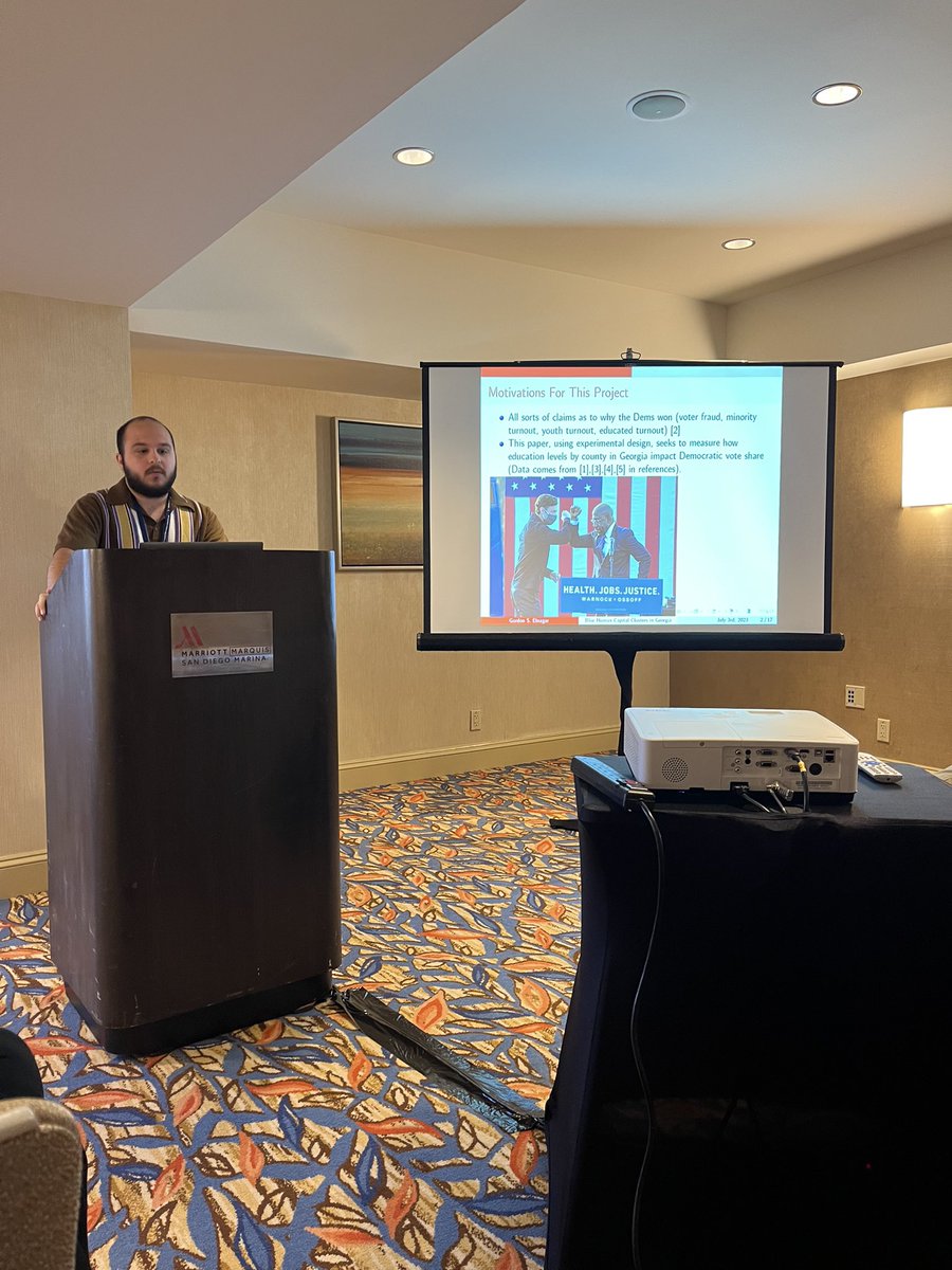 Gordon Elnagar ‘24 presenting his research on demographic shift and voting on Georgia at the Western Economic Association meetings.