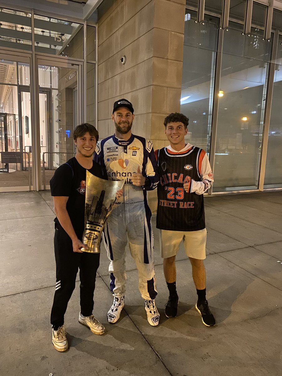Becca_McD's tweet photo. Rain, rain couldn’t keep these boys away! Congrats to @shanevg97 and his team on a great race! #NASCARChicago 🏎️🏆❤️ https://t.co/3jgGYTLUnG