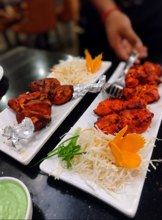 #hello people 😊...with #friends 
'Food is the answer, no matter what the question is'
Btw its #chickentikka and #tandoorichicken with #biryani costed us 800/- INR...