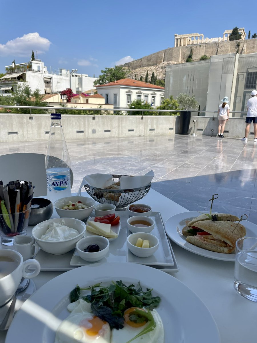 Lunch with a view of the Acropolis! So glad we hiked up there first thing! So beautiful &amp; so hot! ❤️🇬🇷