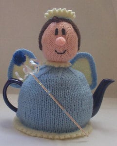 Spreading magic and hot tea - Fairy Tea Cosy Knitting Pattern etsy.me/3JJmH8a #christmas #knitting #fairy #fairyteacosy #teacosy #knittingpattern #doubleknitting #toothfairy #christmasfairy #TeaCosyFolk #knit #knittingtwitter