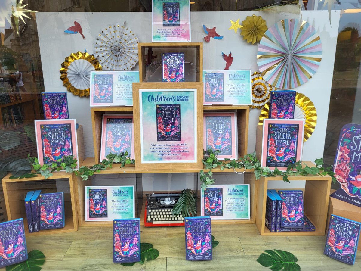City of Stolen Magic is our Children's Book of the Month and look what a pretty window it makes (did you see the sprayed edges?) Not only a gorgeous cover but we think it's pretty spectacular on the inside too!