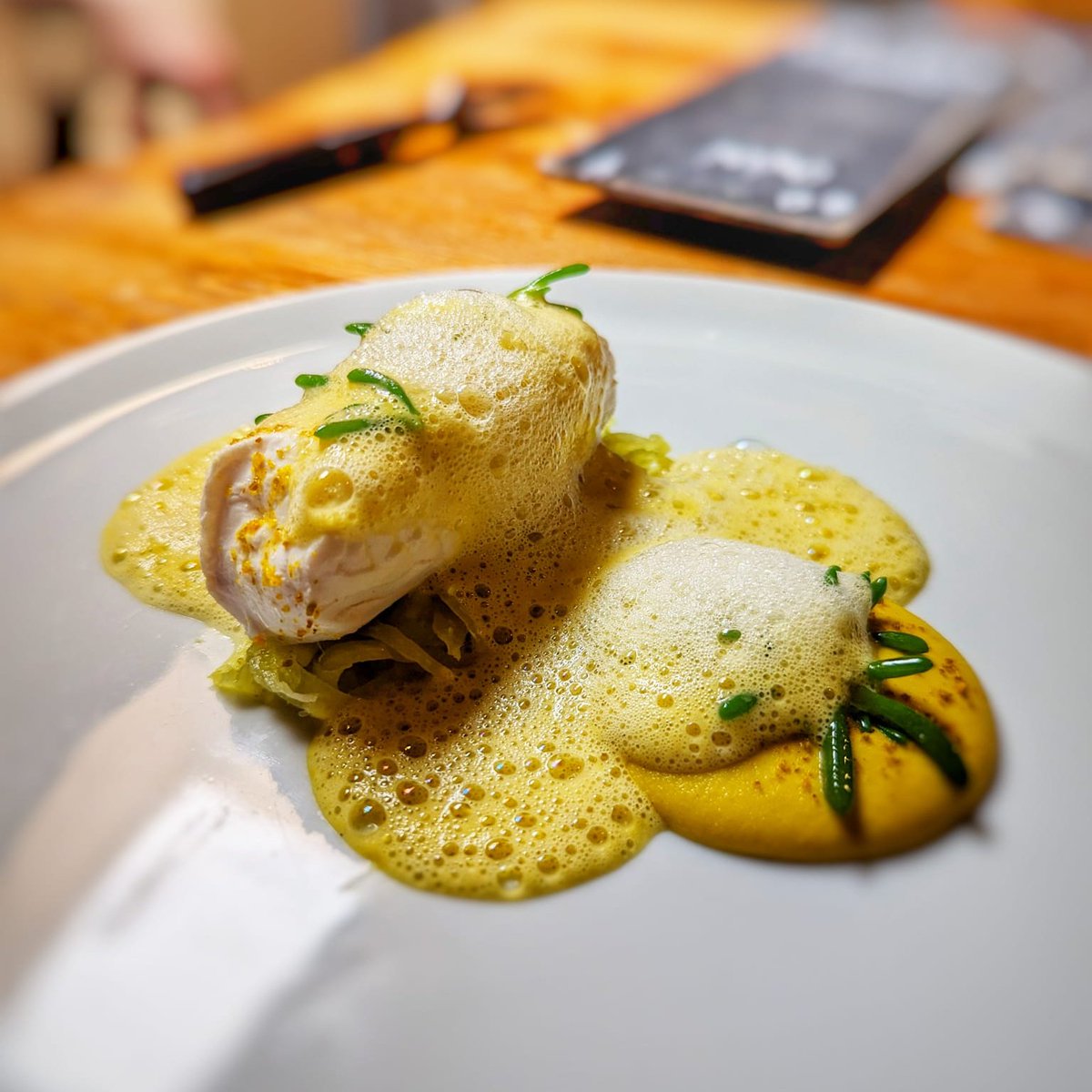 Halibut paired with vibrant orange, garden fennel, a hint of vanilla and sea vegetables. 🐟🍊

A dish to make your taste buds dance! 🍽️

#SeafoodLovers #GourmetExperience #TheOliveBranch