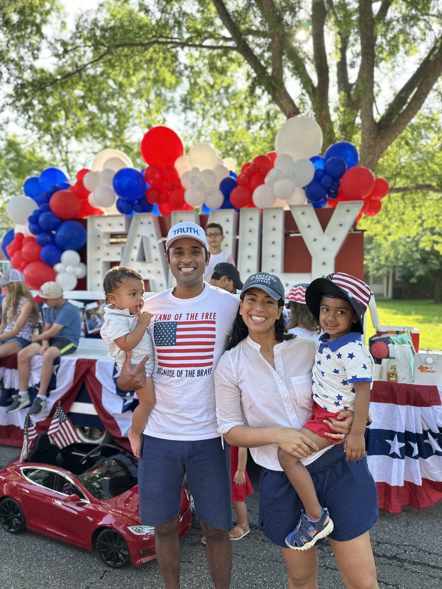 One year ago, we did our neighborhood parade &amp; then went straight to the hospital where Apoorva gave birth to Arjun. Today the little man joined us for it! So grateful for our family &amp; our country. Happy Fourth! 🇺🇸