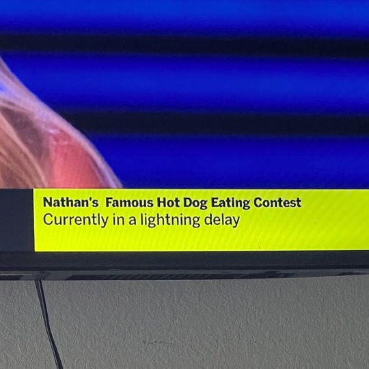 br_betting's tweet photo. Ain't no way we got a lightning delay on THE HOT DOG EATING CONTEST 🤣 https://t.co/NFYDEDIKY2