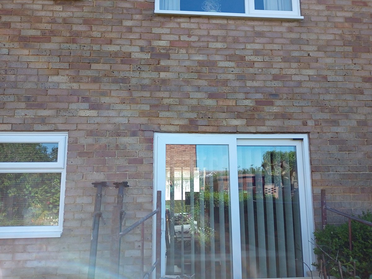 WRepointing's tweet photo. Just started this project in Sompting, West Sussex.
I have installed a new galvanised angle steel above the patio door as there wasn't one there before and the brickwork was starting to drop. Starting the window tomorrow. https://t.co/vcSMTletaR