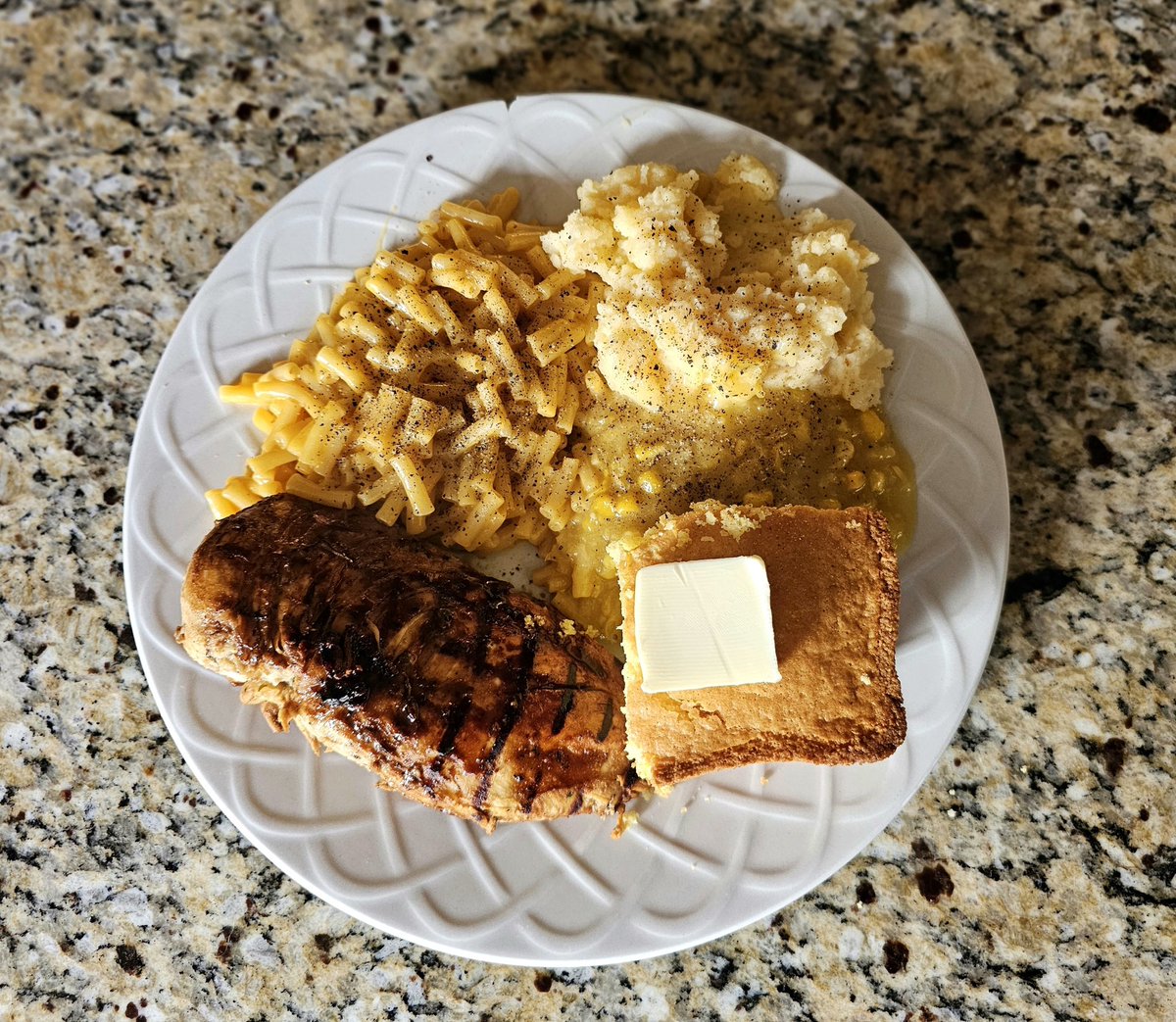 Tonight's dinner was a blast from the past! The chicken is a little different, but the creamed corn, mashed potatoes, cornbread, and Kraft mac and cheese are the same! Also, they are all the same color. 🤣