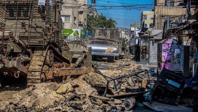 ahm_nahar's tweet photo. No, not Ukraine.

Jenin, Palestine.

No condemnation, no front-page news.   Israel killed 10 Palestinians, half of them teenagers. 
Hundreds wounded and thousands had to flee their homes.
 Israel even bulldozed water and electricity pipes. What kind of depraved behavior is this? https://t.co/q8RdTdWfNL