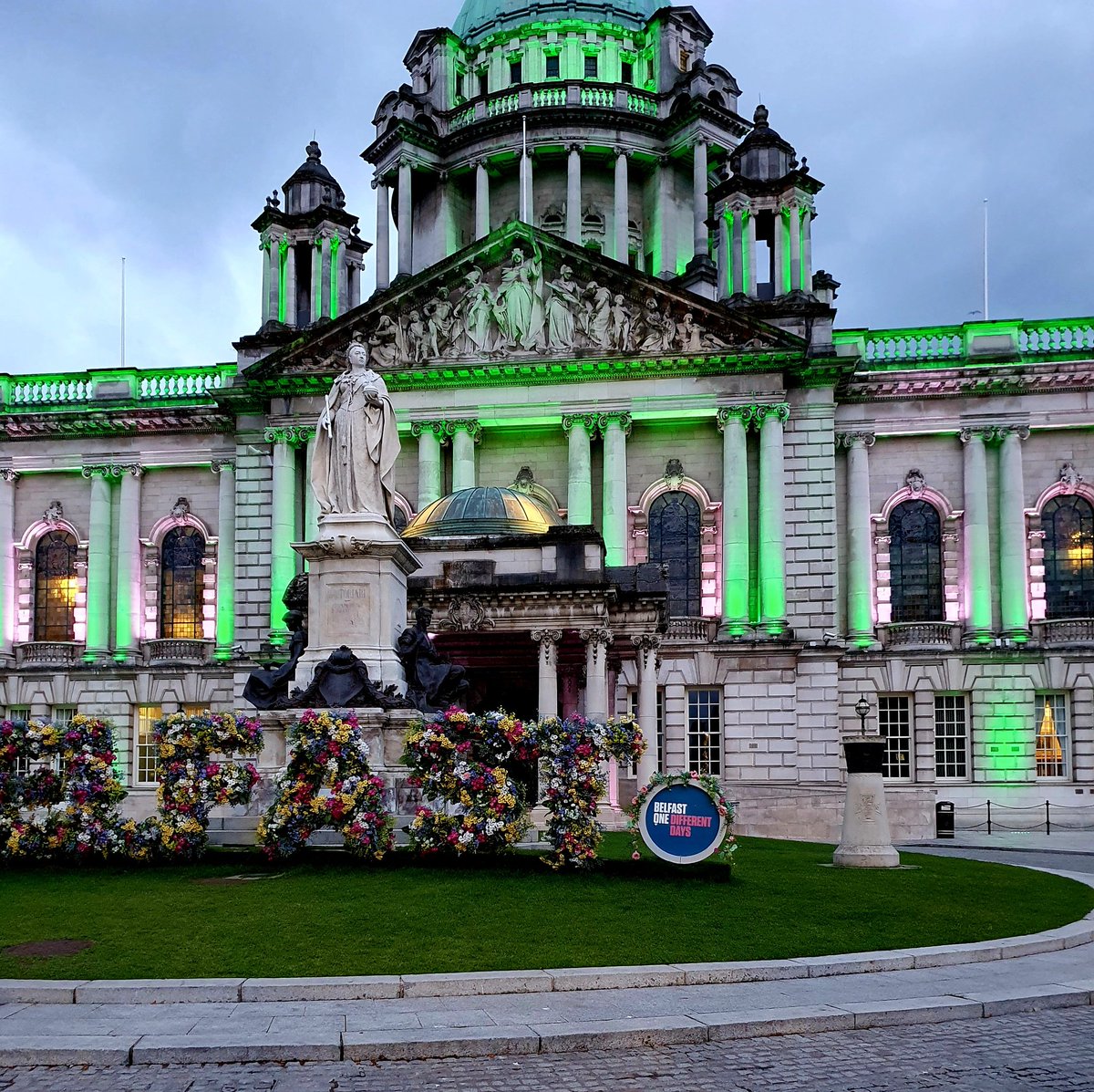 RemSrebNI's tweet photo. Belfast City Hall going green and white tonight in memory of the victims at Srebrenica. #SrebrenicaNI https://t.co/uFy7yaLsob
