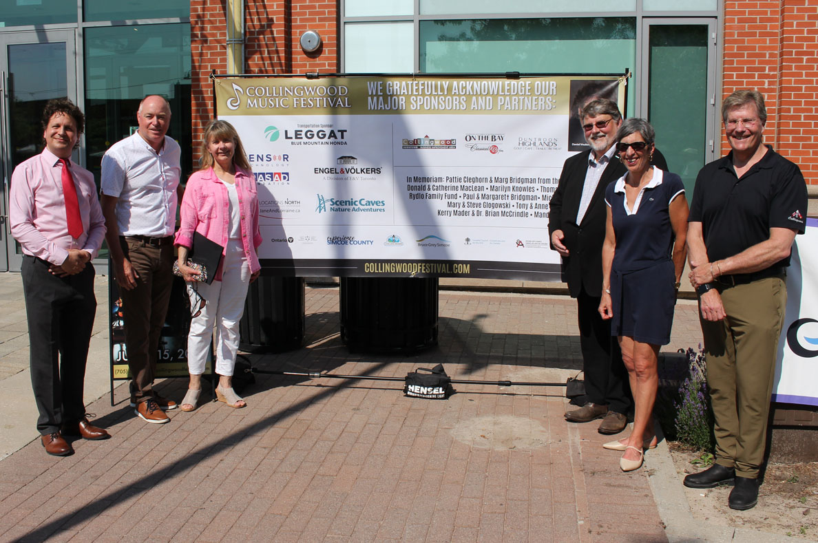 Special Flag Raising Ceremony.  

L-R  <a href="/collingwoodfest/">Collingwood Music Festival</a>  Artistic Director Daniel Vnukowski, Simcoe-Grey MP Terry Dowdall, Collingwood Mayor Yvonne Hamlin, Clearview Mayor Doug Measures, Ontario Trillium Foundation representative Debra Bloom Hall, Simcoe-Grey MPP Brian Saunderson