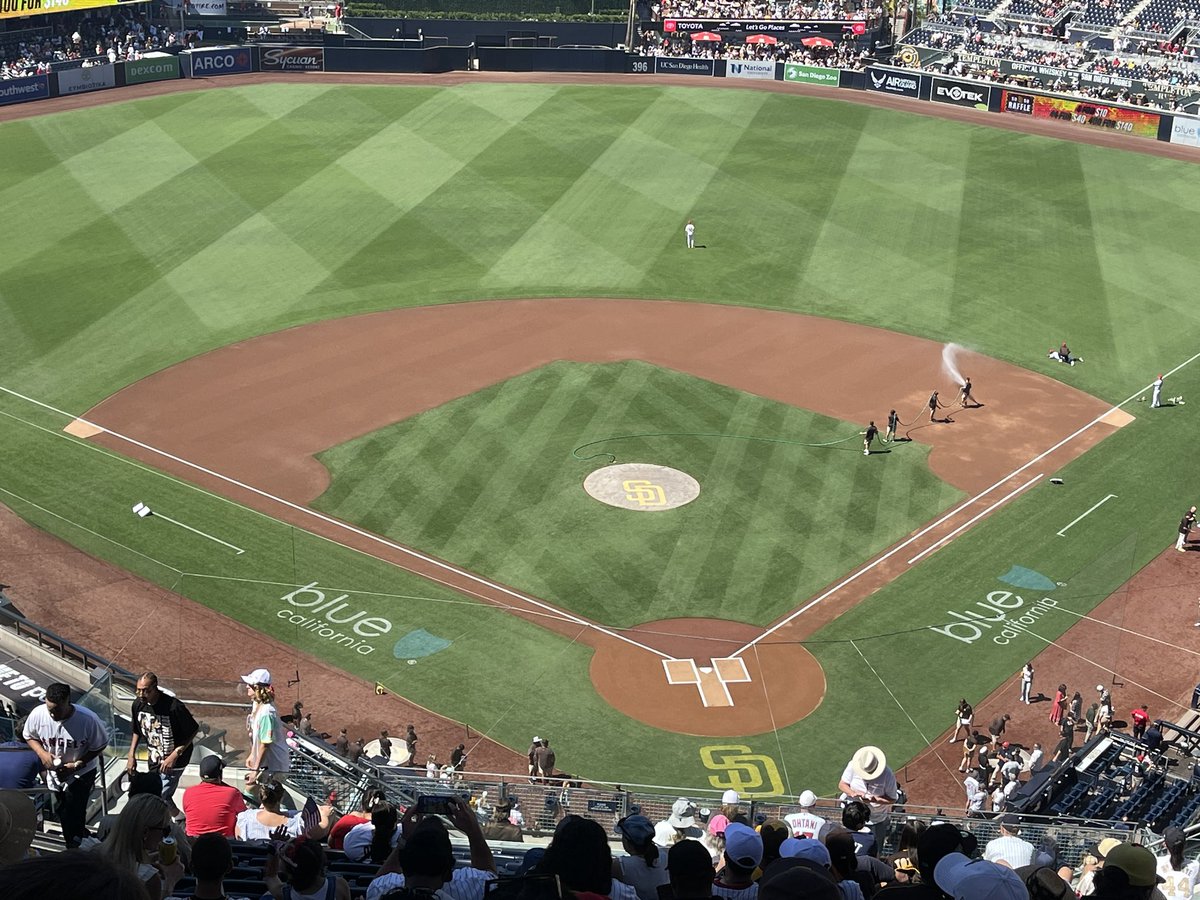 ScottTokar's tweet photo. @PadresRadio Question. In pre-game foeld prep, I can understand why the groundskeepers keep the batters box dry, but why is it dry at the end of the first and third base lines too? https://t.co/AgFJ2JgjkJ