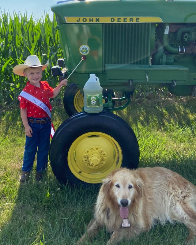 Everett won local royalty and wanted to ride on the tractor in the parade. I told him we needed #andyclean's help to make it look presentable. Bo dog just wanted to be in the picture haha!
