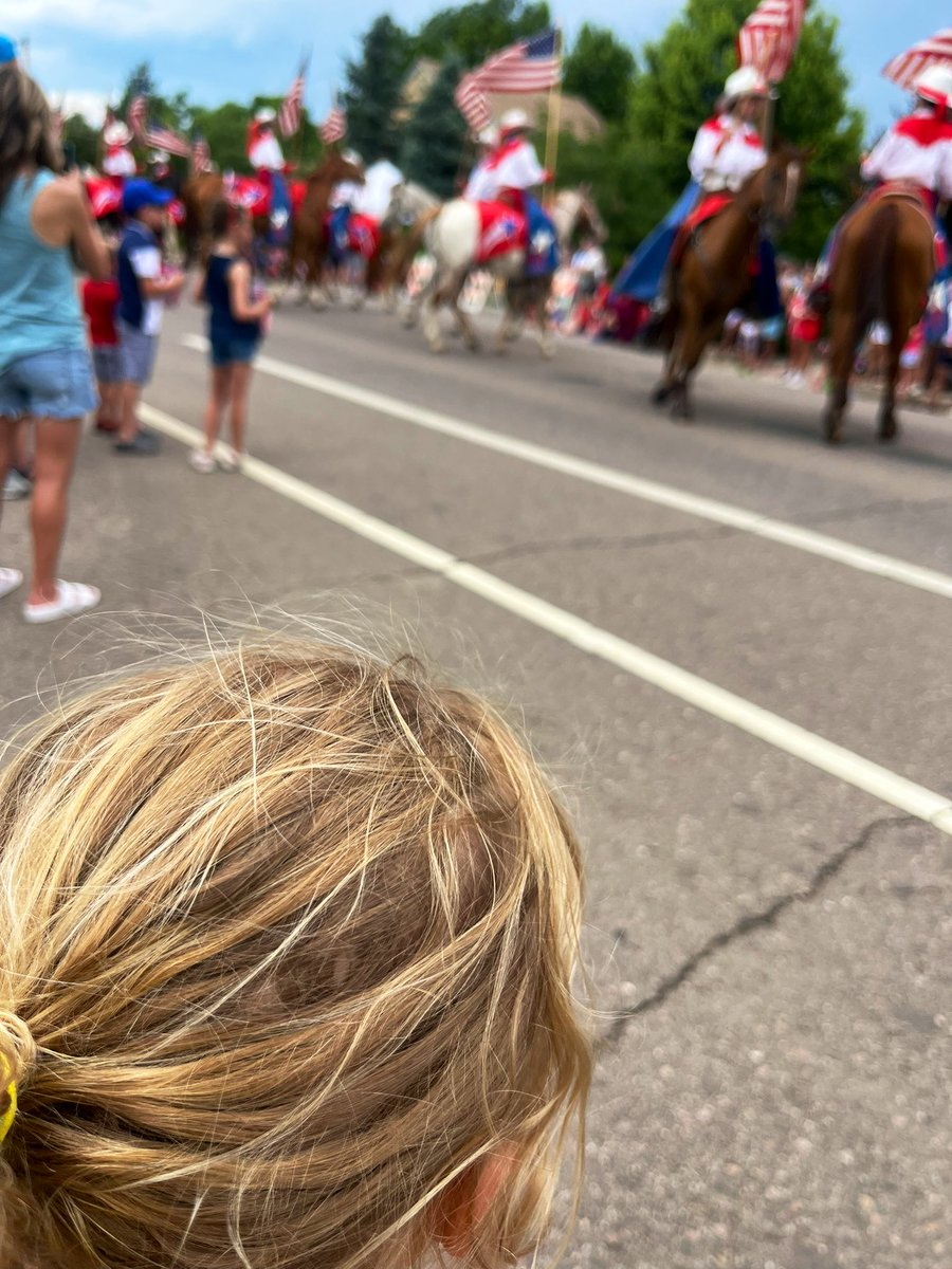 KyleClark's tweet photo. The kid and her Dad love a parade, especially one with horses. Thank you, @Westernaires, for always coming to Park Hill on the Fourth! https://t.co/aUKJ5JBe7j