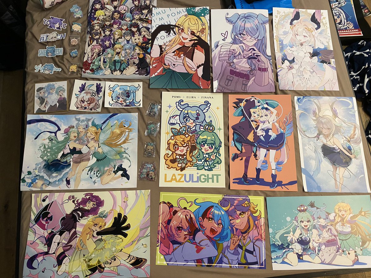 PriestismJP's tweet photo. With #AX2023 coming to a close, here is my full haul. Didn’t go quite as trigger happy as 22, but still quite a bit. Artists in the reply 😀

This year’s bias: #NIJISANJI_EN (particularly #Lazulight) #OshiNoKo  #BocchiTheRock. Lazulight’s concert inspired me to go on a rampage 😈 https://t.co/9Fe1ct3W2s