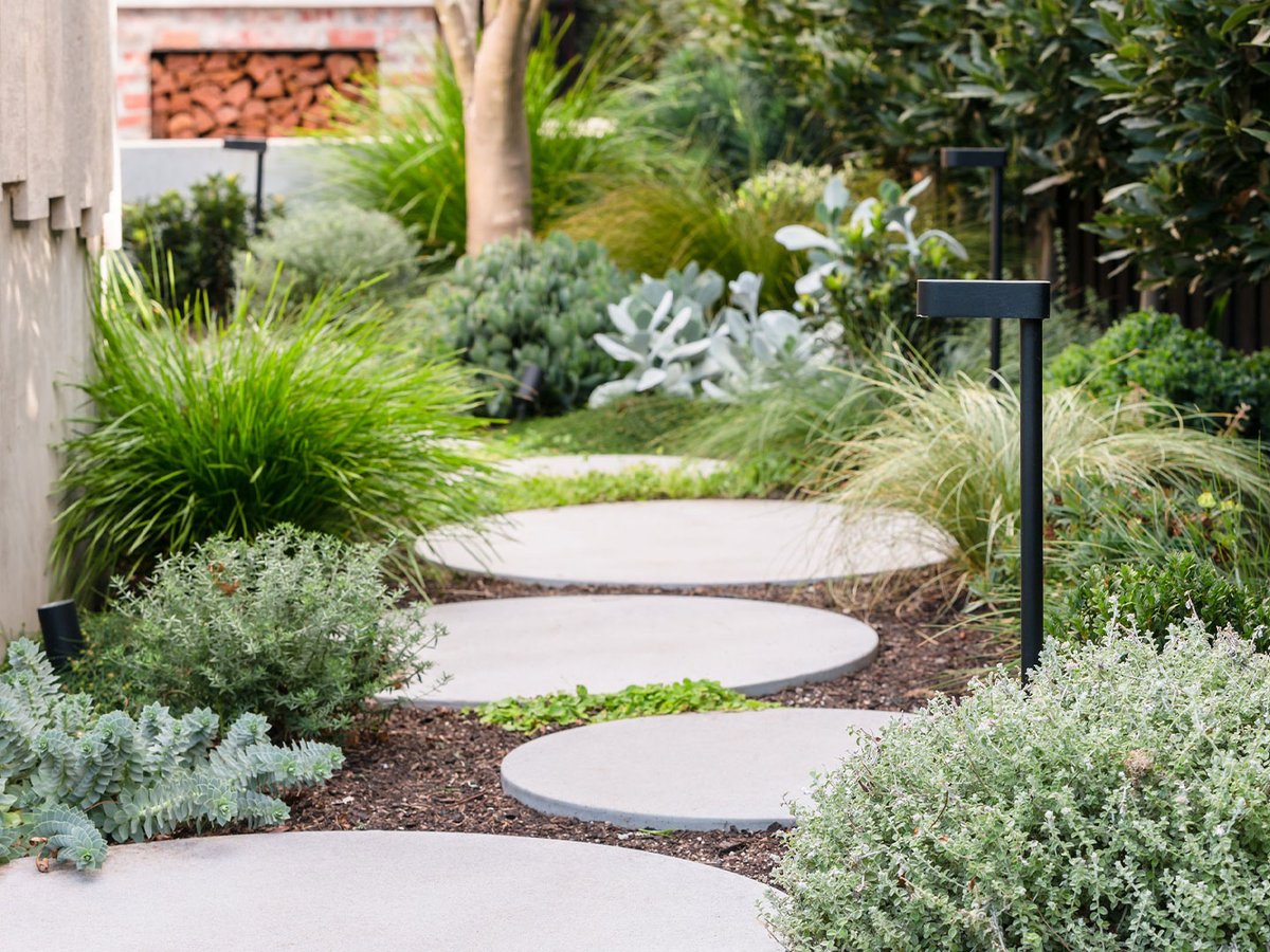 Getting down into the detail 👀

A closer look at Anston #circularsteppers, surrounded by layers of soft #greenery at <a href="/COSDesignStudio/">C.O.S Design</a>'s Mornington project.

Plants: Warners Nurseries
Lighting: Gardens at Night