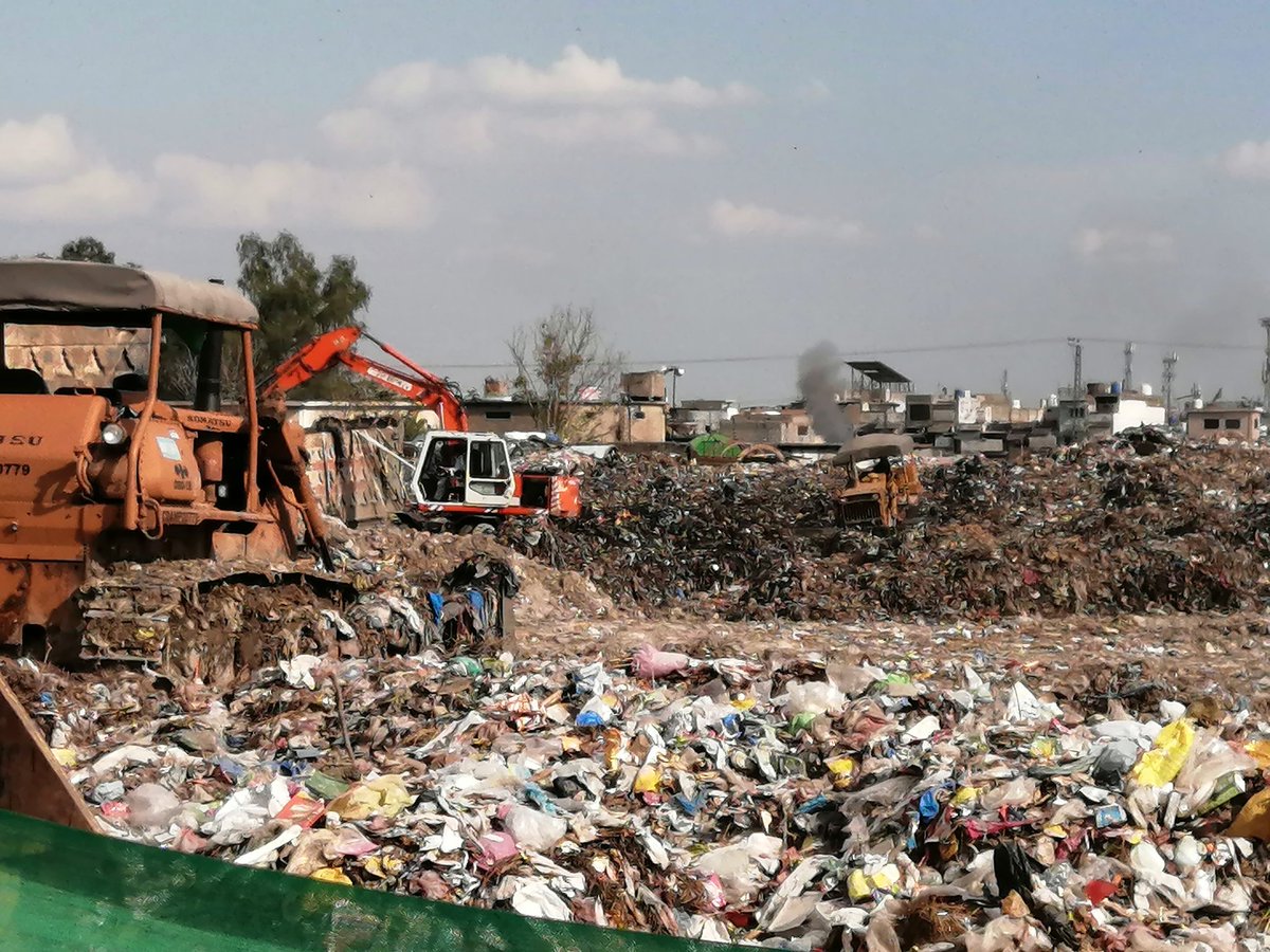 I10Isb's tweet photo. The slogan of @CDAthecapital was
 "Islamabad , The beautiful ".
Welcome to the New Islamabad,  Having Garbage Transfer dumping site just next to the residential area at Sector I-11. Despite many complaints, Babus have different priorities 
@CMShehbaz
@RanaSanaullahPK
@Noormengal_ https://t.co/H0ZeVtFT06