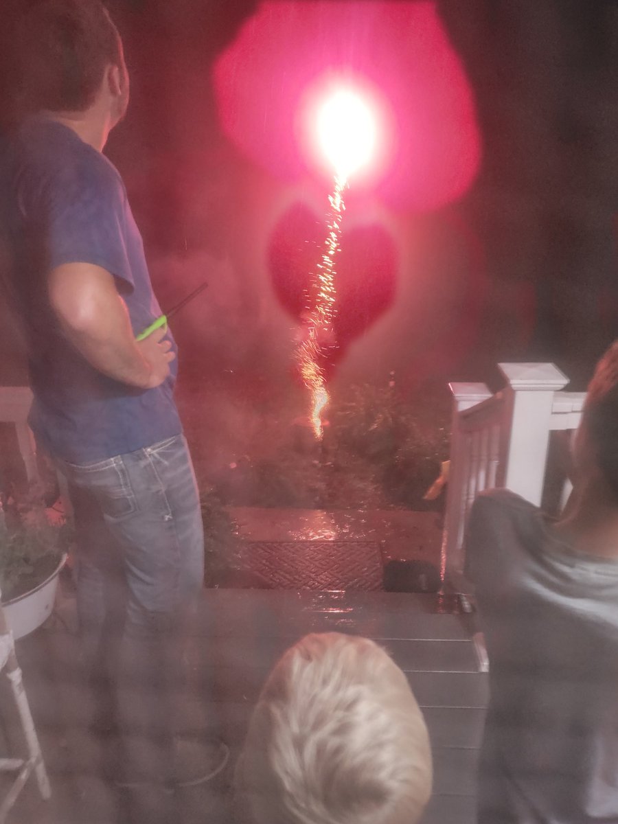 Lighting fireworks off the edge of the porch cuz it's pouring rain here in western iowa.on the 4th of July. Bad for markets, good for 🌽 #agritalk