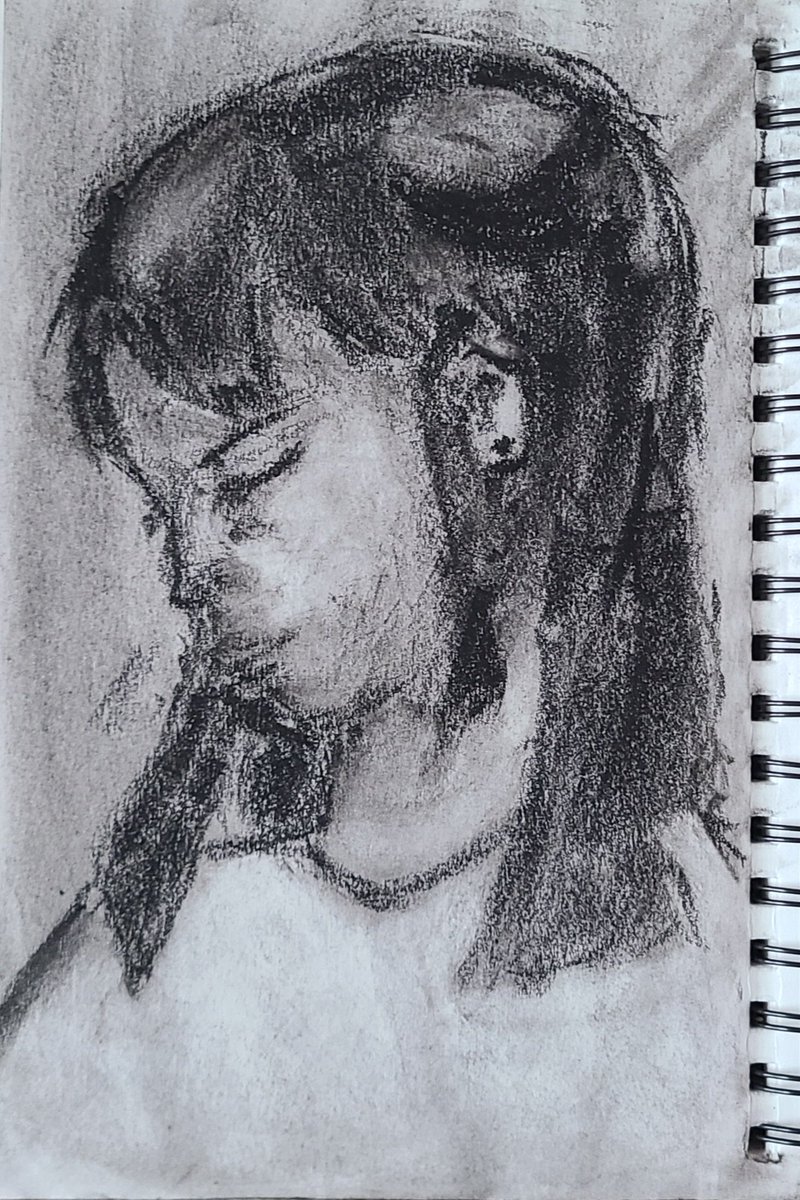 Forgot to post it here but first attempt at a charcoal portrait. Meant to be dark hair <a href="/munibug/">muni 🐈‍⬛</a> charcoal's pretty fun