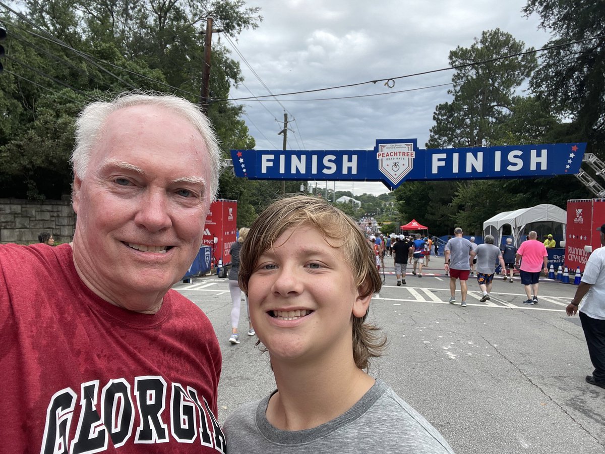 Tuba65's tweet photo. Treat today was completing the Peachtree Road Race with 12-year-old Landon. Been a fun journey over the years that began watching him *compete* in the Peachtree Junior. Thanks @ATLtrackclub and @ajc for helping make memories. #ajcprr https://t.co/9rqXPggNo4