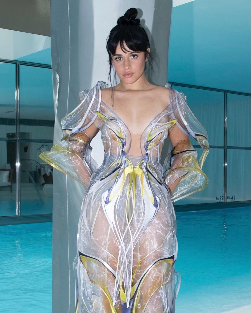 WORLDMUSICAWARD's tweet photo. #CamilaCabello stuns at Paris Fashion week in an amazing #IrisVanHerpen ensemble! 📸✨🌟🗼🇫🇷👑💛 https://t.co/Ge9Ss3hsAG