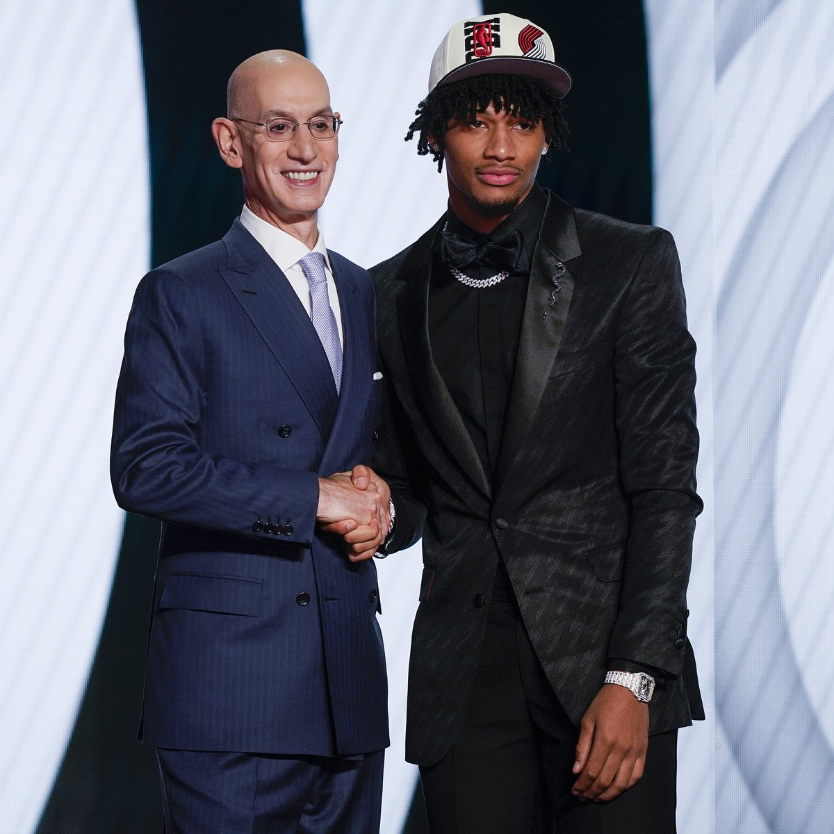 Dame_Time1023's tweet photo. The Blazers got insane value from their draft picks the last 2 years, blessed 🥹

2022: Shaedon Sharpe with pick 7
2023: Scoot Henderson with pick 3

These are two of the most intriguing young talents in the league rn under 21 https://t.co/4JqKZzzN9k