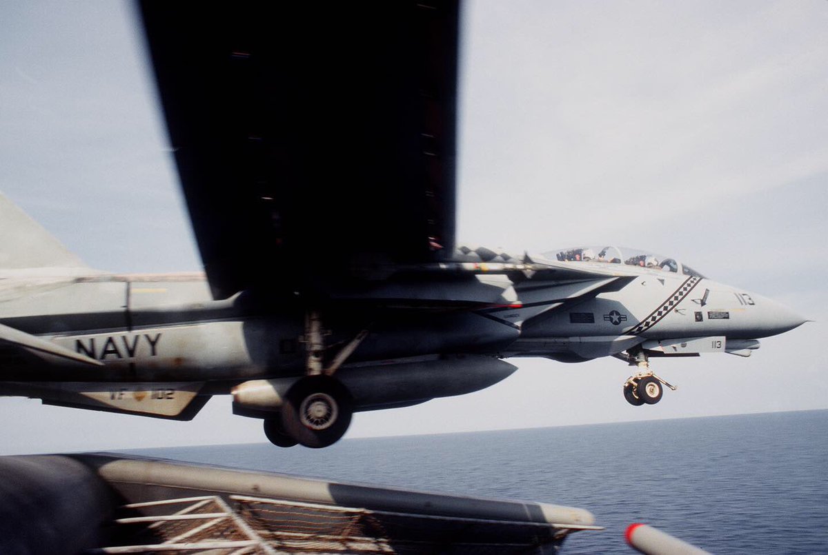 Boneyardsafari's tweet photo. Throwing in a bit of #tomcattuesday with a Turkey launching from USS America in 1993.  No bridle needed, the tow bar is in the down position as it just came off the cat. #vf102 #f14 #topgun #ussamerica #cv66 #aviationsafari #aviationpreservation #boneyardsafari https://t.co/9kCjCHJdqN