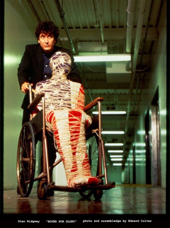 Stan_Ridgway's tweet photo. And again a happy dappy #4thofJuly 2023. Photo taken 1986 at #TheBrewery #DTLA by #EdwardColver with his art #assembledge he called #BoundForGlory #fireworks #wallofvoodoo #DTLA #punk https://t.co/z5BOvjRw40