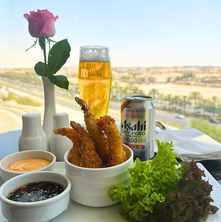 Savor the burst of Korean flavors with our Sweet and Spicy Fried Prawn - a perfect dish for a cozy in-room dining experience! تذوقوا مجموعة النكهات الكورية مع الجمبري المقلي بصوص الحلو والحار - استمتع به في راحة غرفتك!